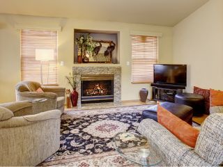 Woven wood blinds adding natural elegance to a Laguna Beach home.